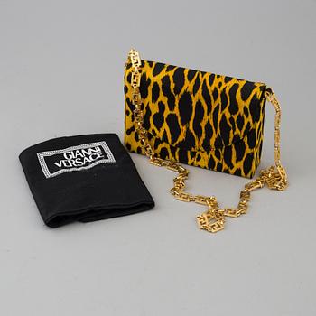 Leopard printed handbag by Gianni Versace.