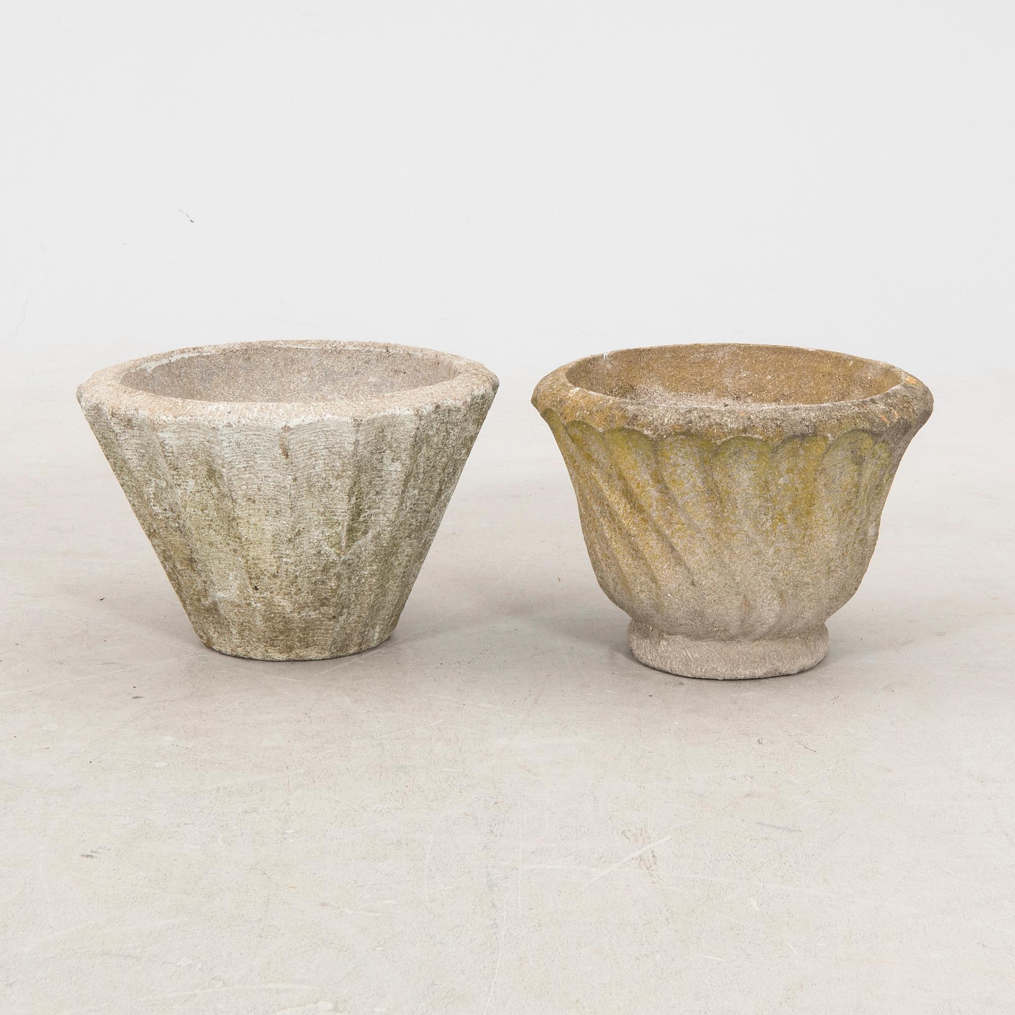 A pair of concrete garden pots middle of the 20th century.