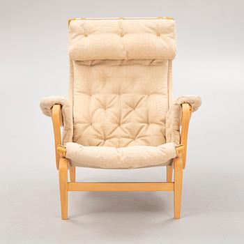 Bruno Mathsson, a 'Pernilla' armchair, Dux, late 20th Century.