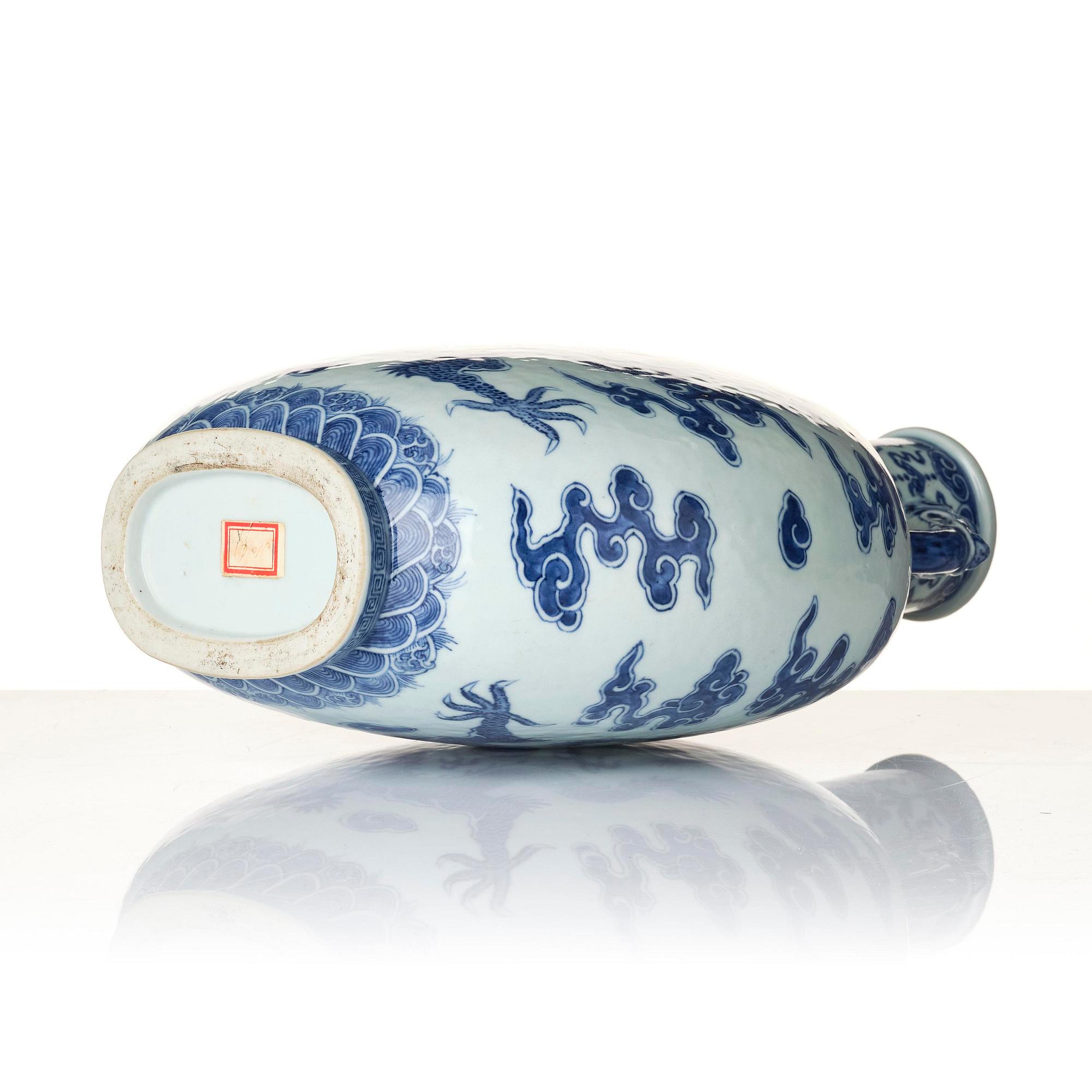 A blue and white 'dragon' moon flask, bianhu, Qing dynasty, 19th century.