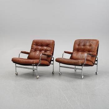 A pair of 'Karin' easy chairs by Bruno Mathsson for Dux, designed 1969.