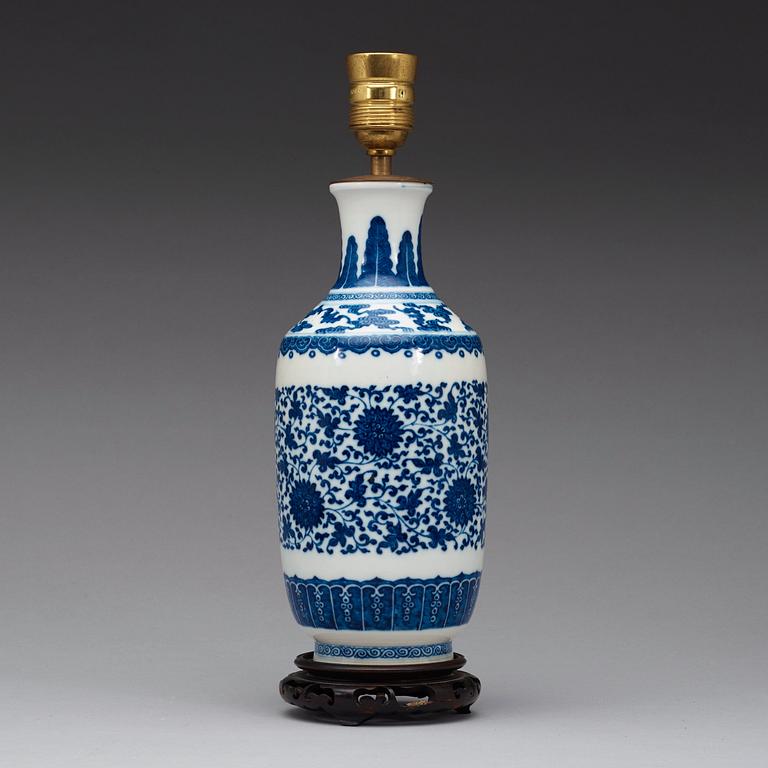 A blue and white vase decorated with lotus-scrolls and bats among clouds, Qing Dynasty, 19th Century.