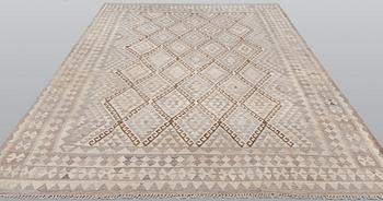 A kilim carpet, ca 312 x 220 cm.