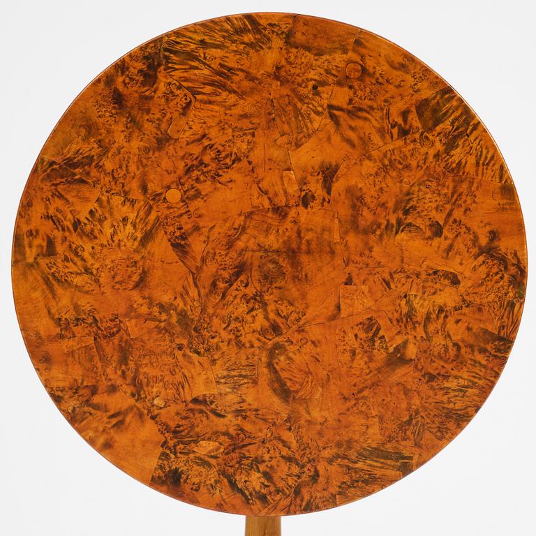 A tilt top table, from around the year 1800.