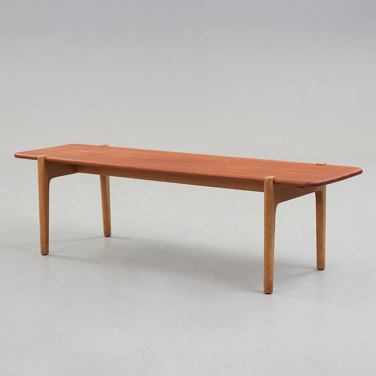 Hans J. Wegner, a solid teak and oak bench/ table, Johannes Hansen, Denmark, 1950-60's.