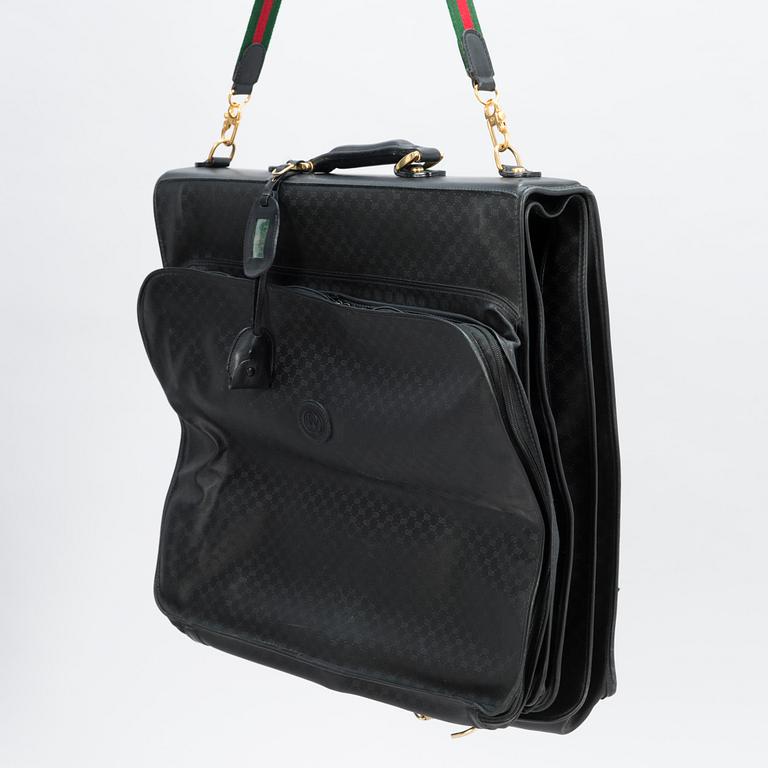 GUCCI, KLÄDÖVERDRAG SAMT VÄSKA, 1980-tal.