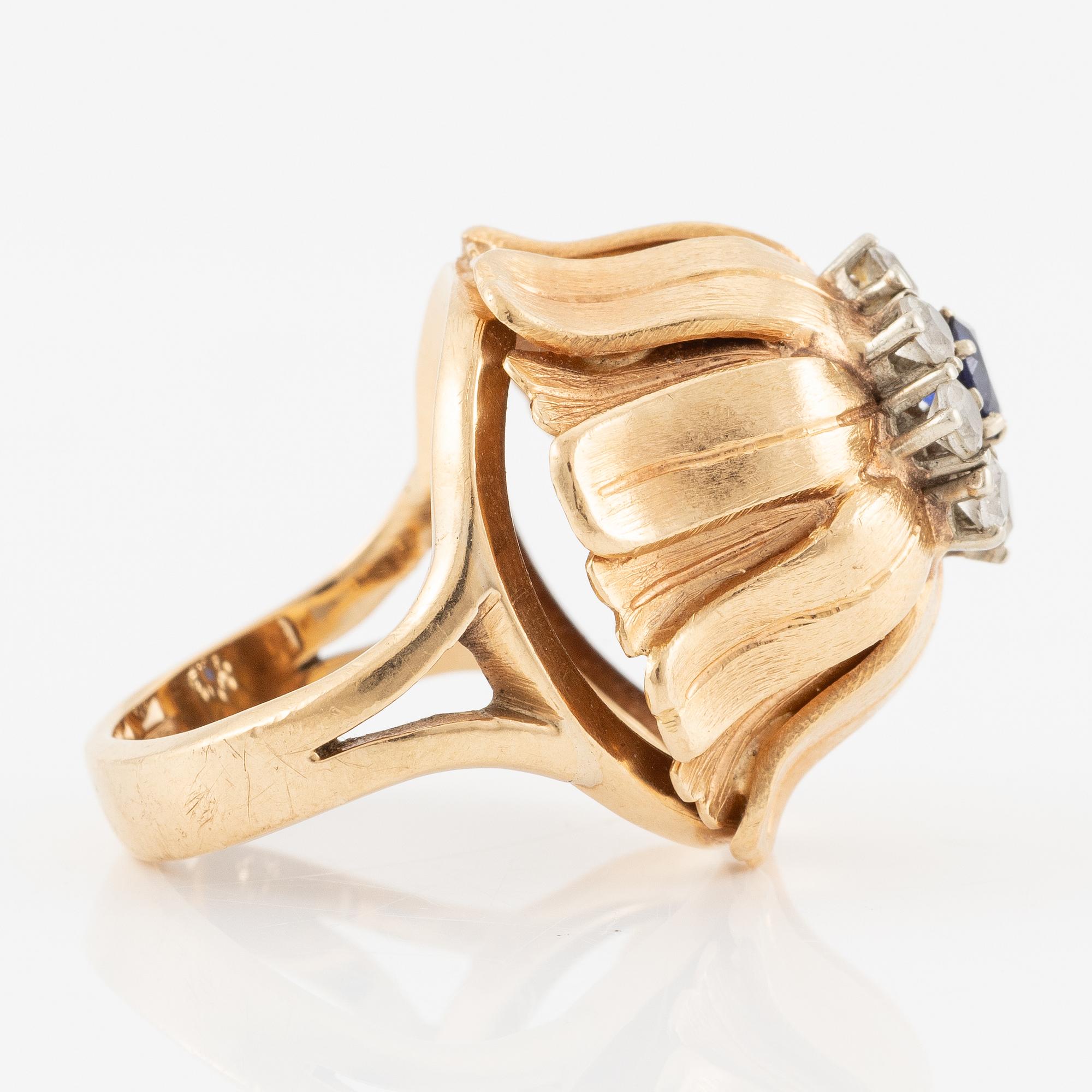 Ring, Hans Scherlund, 18K gold with white and blue stones.