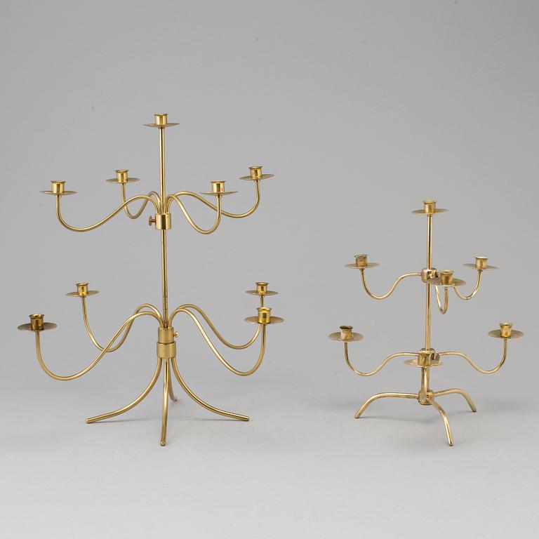 Two brass candelabra, designed by Josef Frank. Firma Svenskt Tenn.