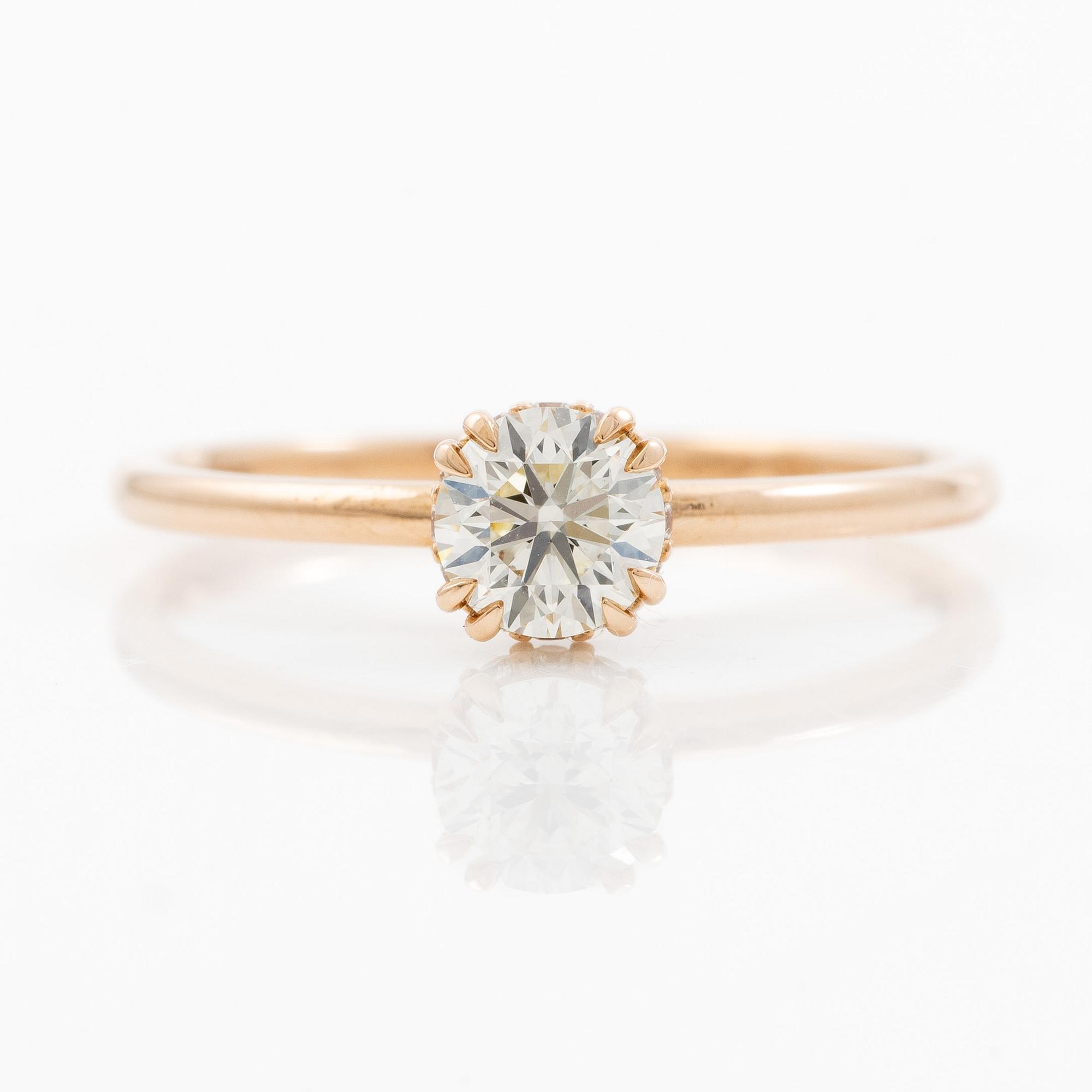 Ring 14K guld med briljantslipade diamanter.