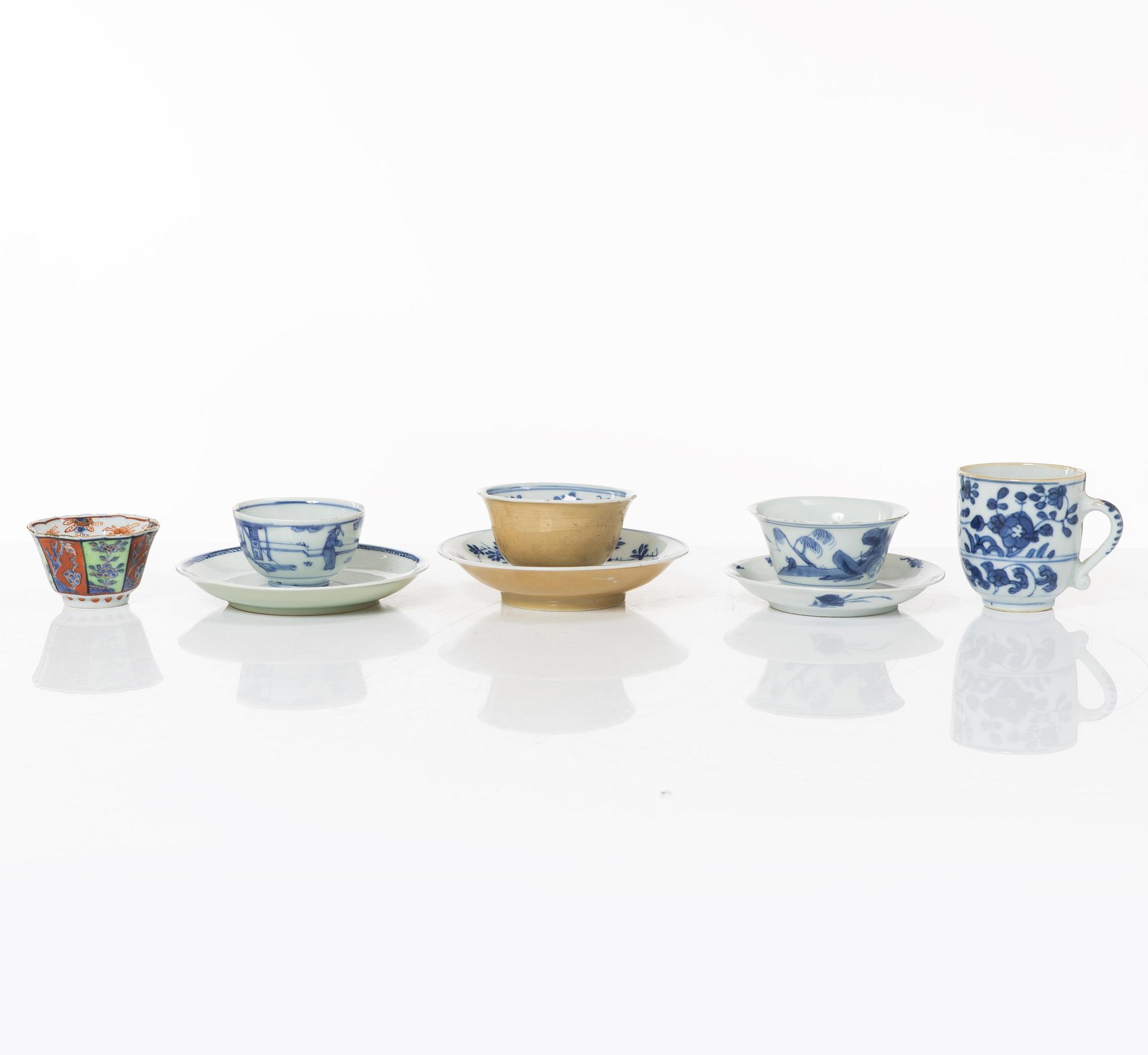 A group of three cups with saucers and two cups, Qing dynasty, 18th century.