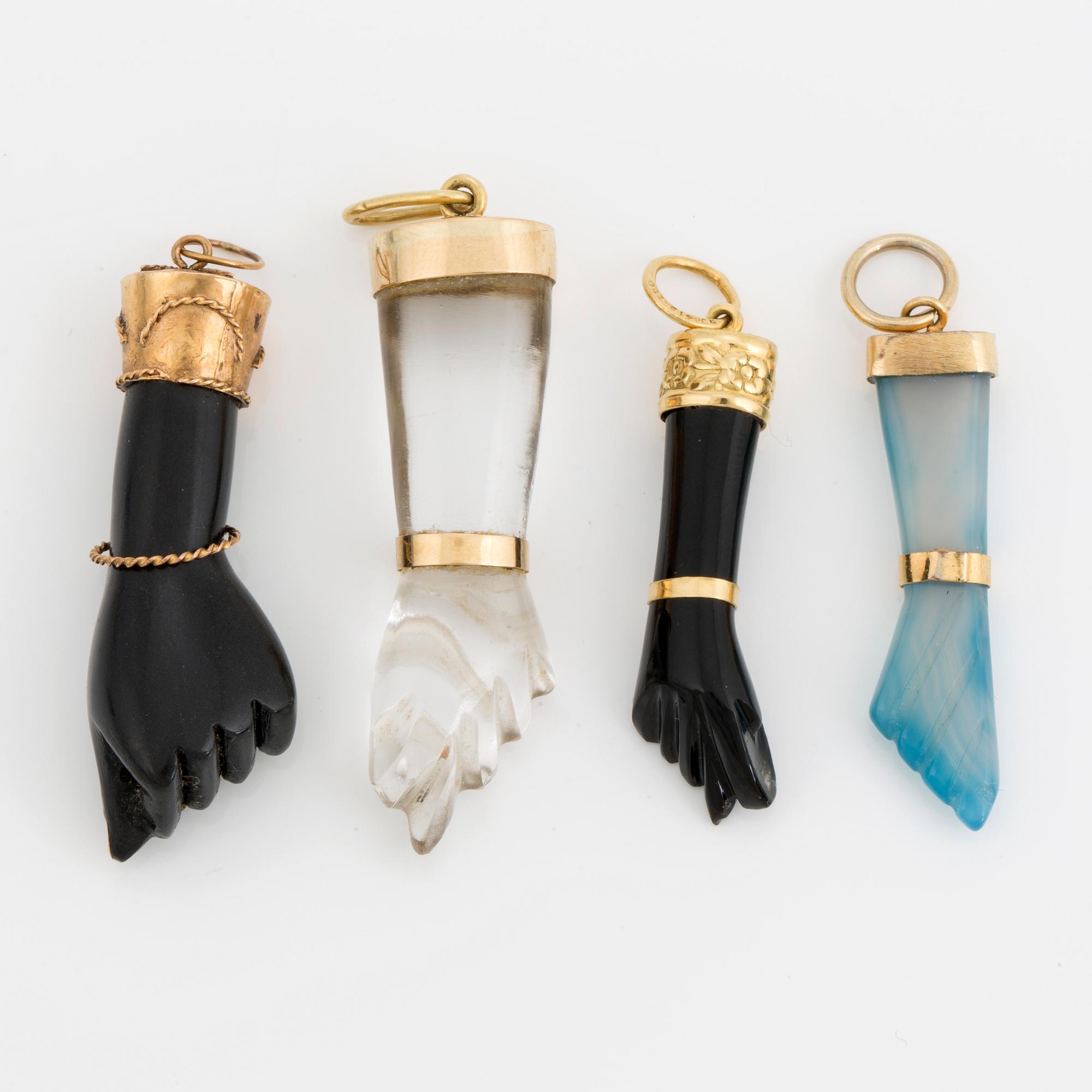 Four Mano fico pendant, including rock crystal and chalcedony.