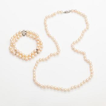 A pearl collier and two-strand pearl bracelet with cultured pearls and sterling silver.