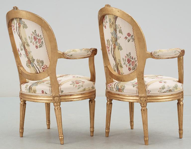 A pair of Gustavian late 18th Century armchairs.