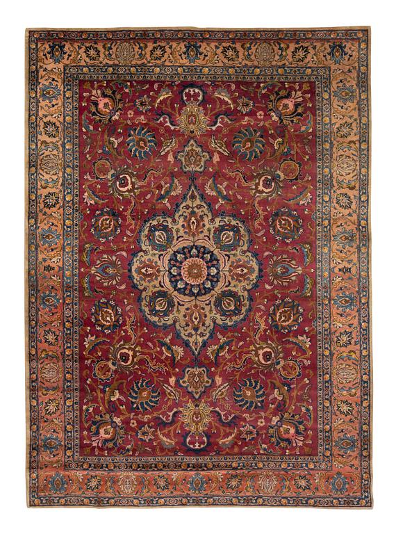 A carpet, semi-antique Tabriz, ca 357,5 x 256 cm.