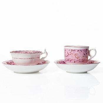 Twelve cups and saucers, England, 19th century.
