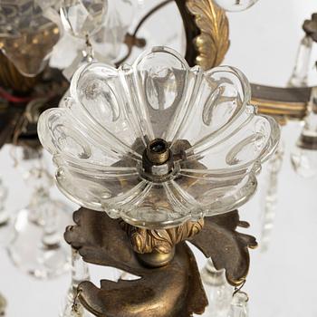 A six-branch rococ-style chandelier, first part 20th century.