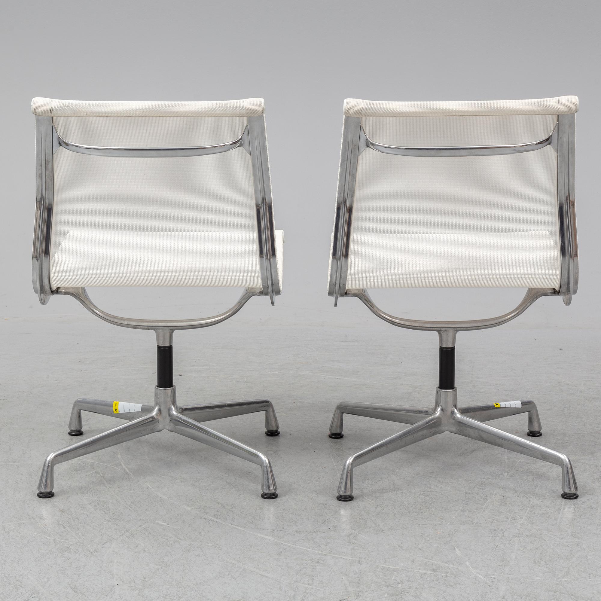CHARLES & RAY EAMES, a pair of 'EA 101' chairs, Vitra.