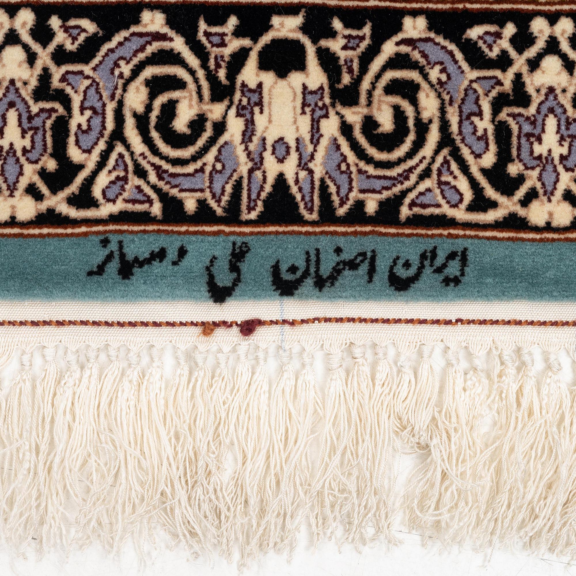 A signed pictoral Isfahan rug, Central Persia (Iran), signed, c. 235 x 154 cm.