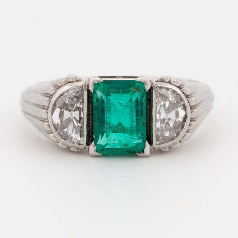 A WA Bolin platinum ring set with a faceted emerald ca 0.90 cts.