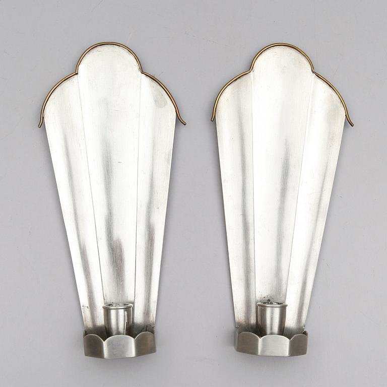 VÄGGLAMPETTER, 1 par, tenn, Firma Svenskt Tenn, stämpel 1925.