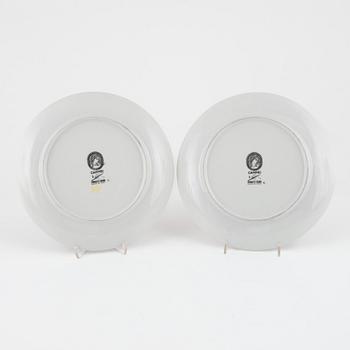 Piero Fornasetti, a pair of porcelain 'Cammei' plates, Fornasetti, Milano.