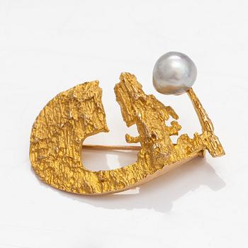 Björn Weckström, "Sun ship", a 14K gold brooch with a cultured pearl. Lapponia 1967.