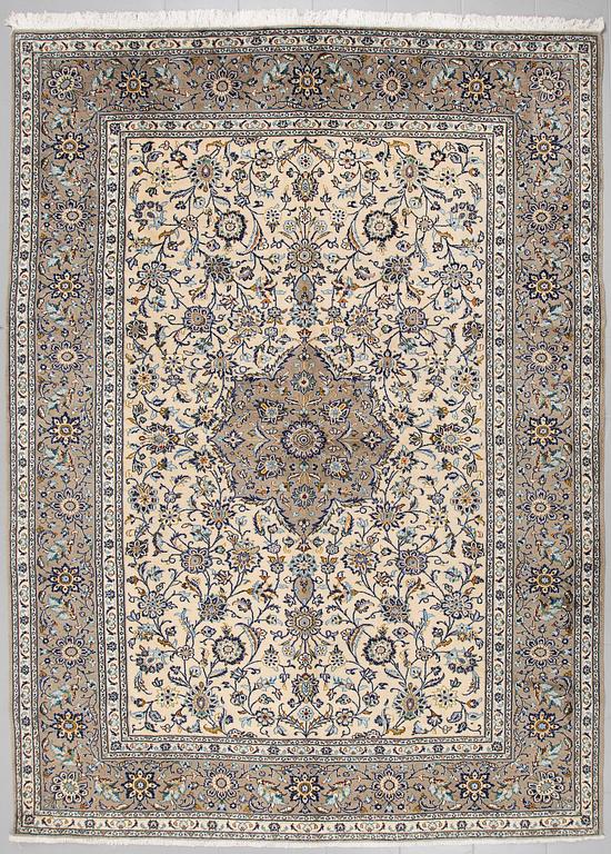 A Keshan rug, 325 x 240 cm.