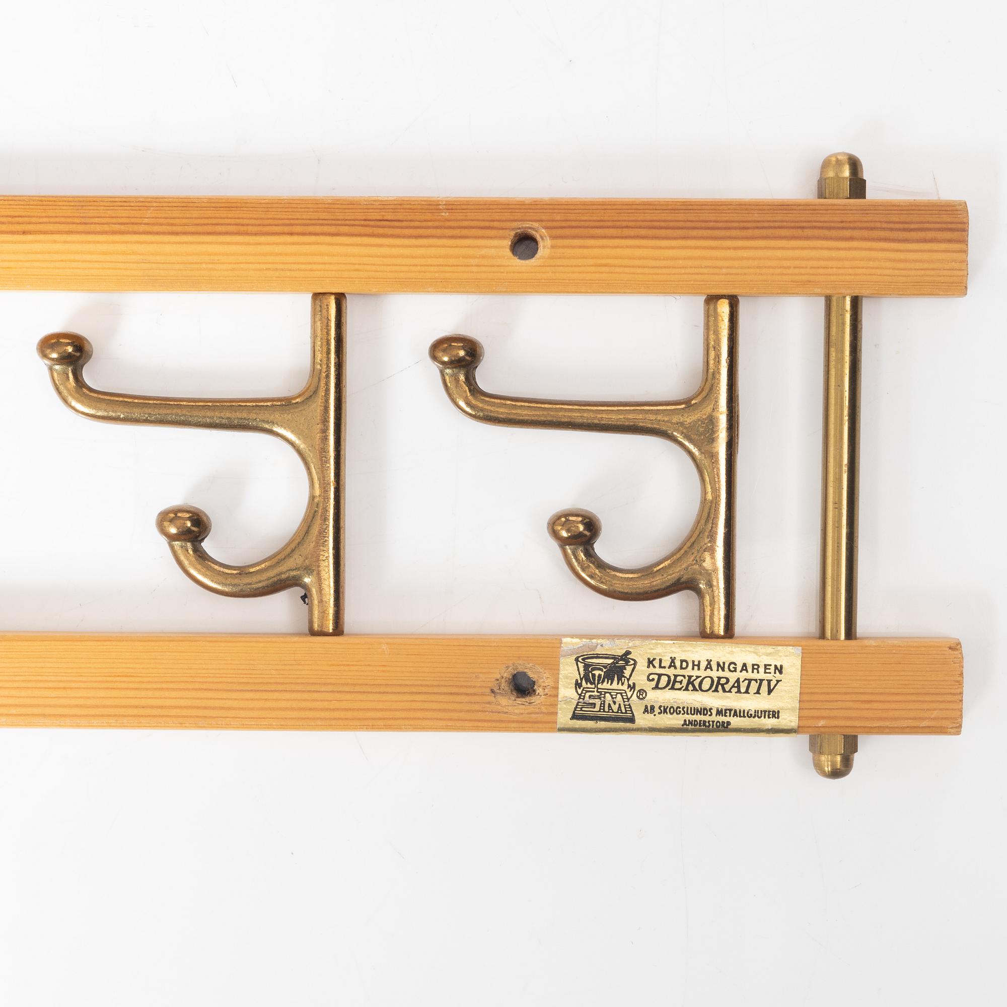 A set of three 'Decorative' coat hangers, Skoglunds metallgjuteri, Anderstorp, 1950s/60s.