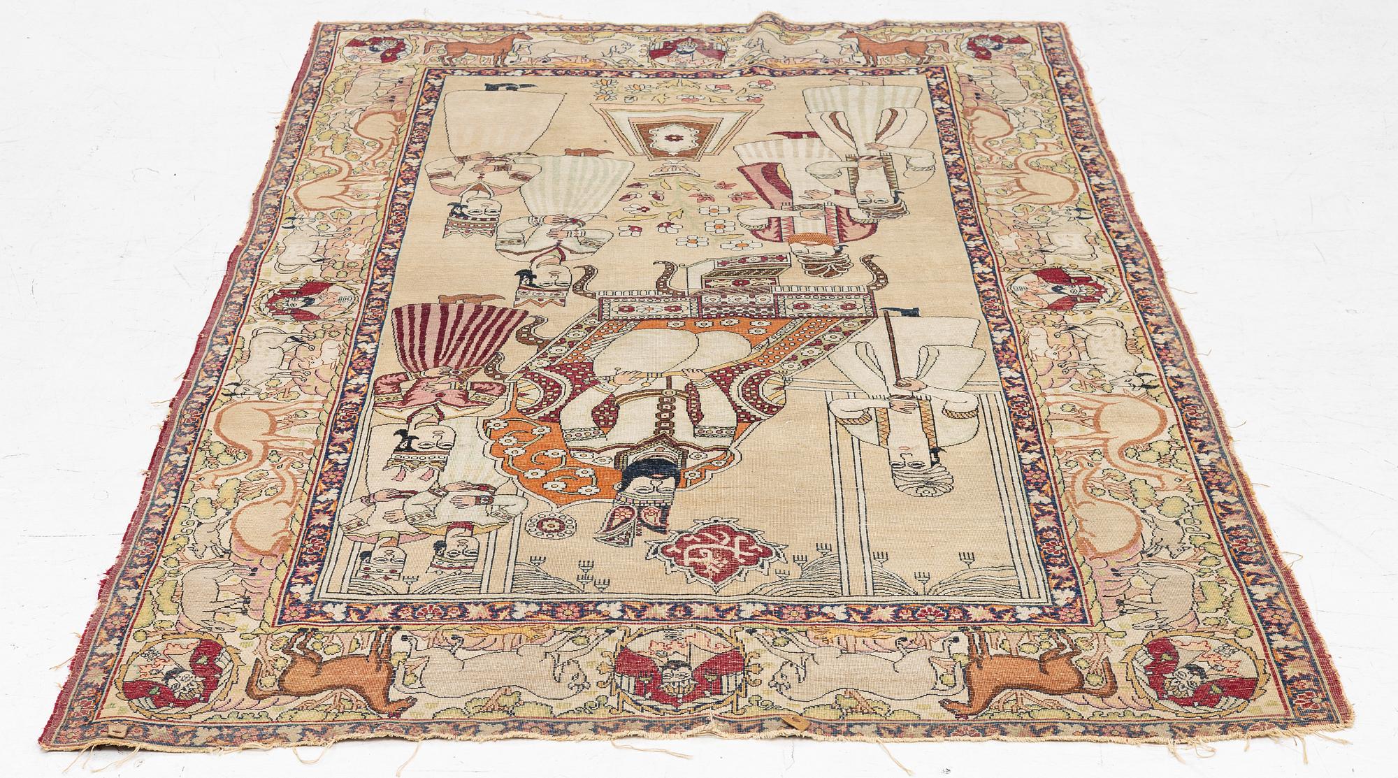 An antique Kerman Laver rug, South Persia, signed c.206 x 133 cm.