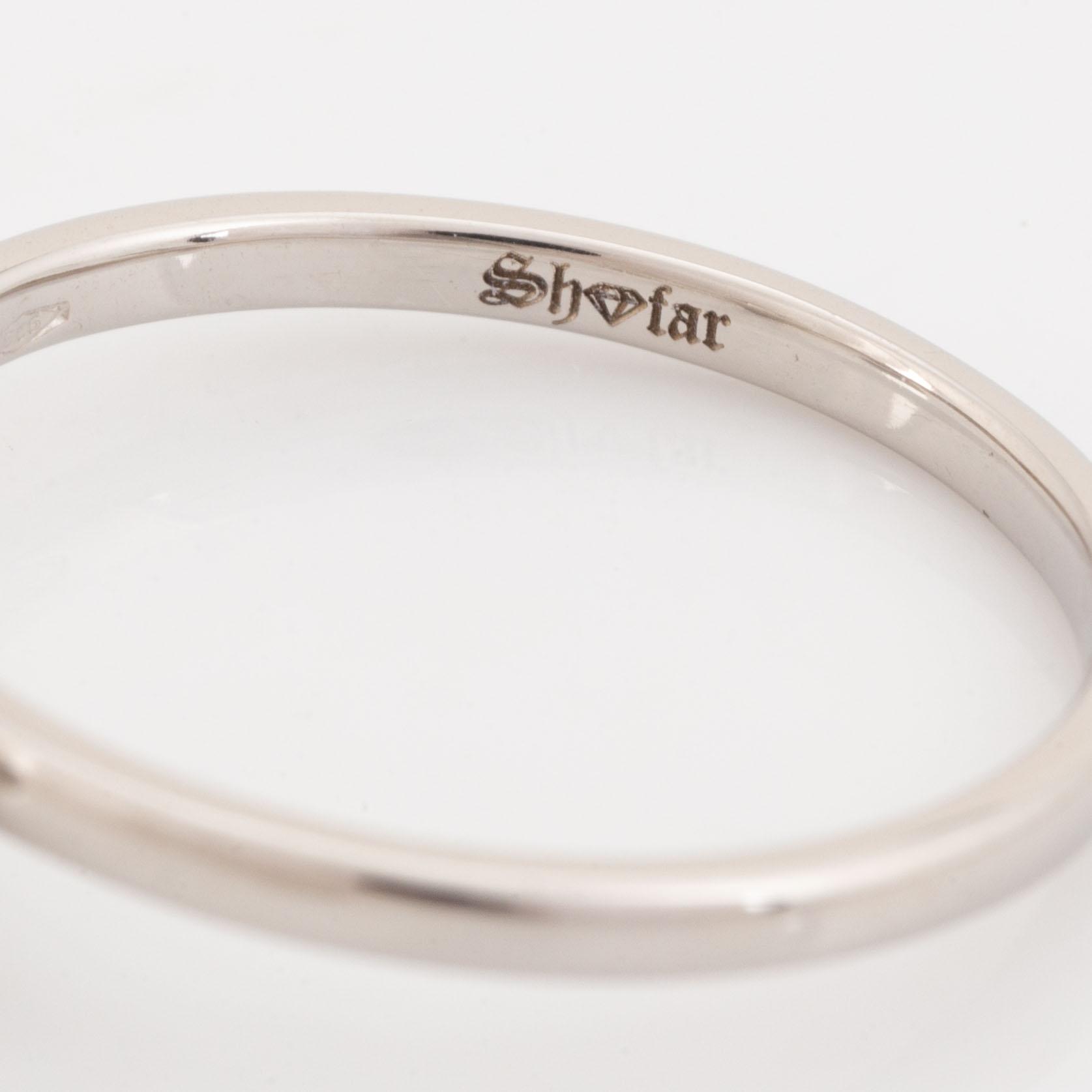 Cushion cut diamond ring.