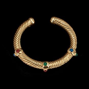 ARMBAND, 18 k guld med färgade stenar, 1900-talets senare hälft, vikt 35,5g.