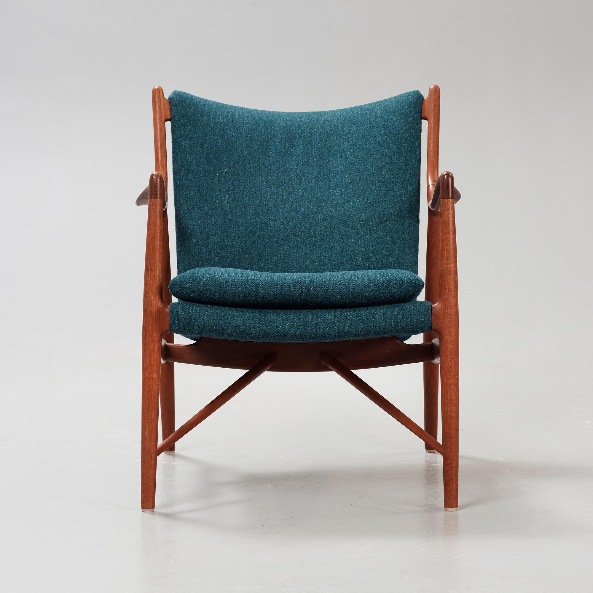 A Finn Juhl 'NV-45' teak easy chair, by cabinetmaker Niels Vodder, Denmark 1950's.
