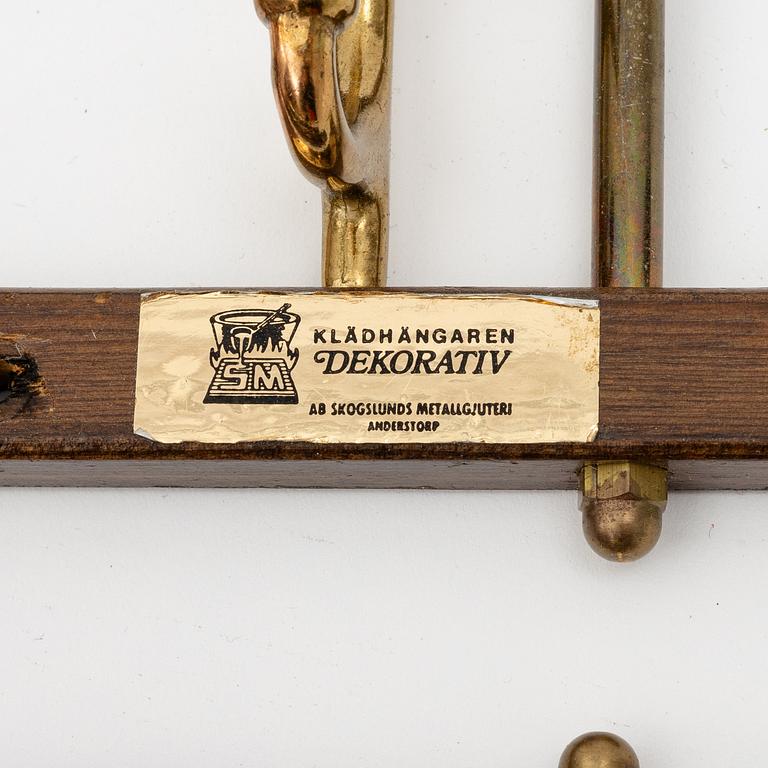 A set of three 'Dekorativ' coat hangers, Skoglunds metallgjuteri, Anderstorp, 1950's/60's.