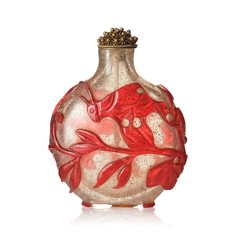 A red overlay Beijing glass snuff bottle, Qing dynasty.