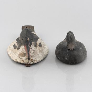 A set of six wooden duck decoys, 20th century.