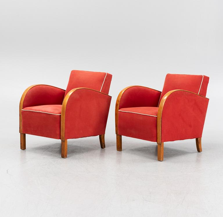A pair of 1930's/40's armchairs.