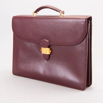 A Cartier leather briefcase.