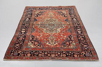 A RUG, an antique/semi-antique Kashan Motachem, ca 213 x 141,5 cm.