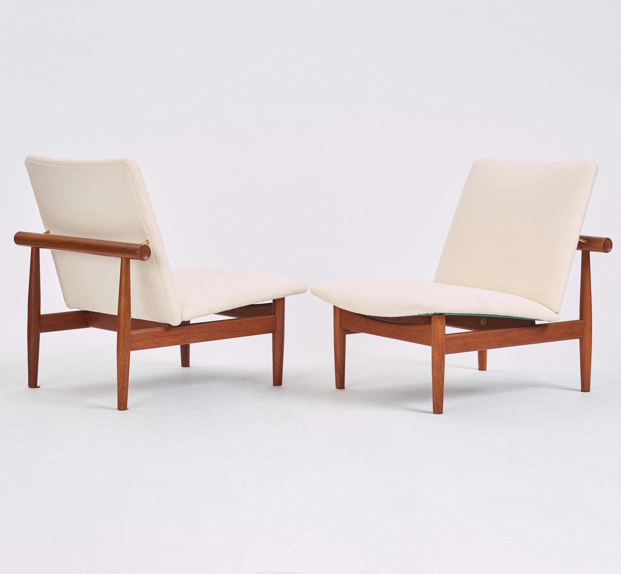 Finn Juhl, a pair of 'Japan' (FD-137) easy chairs and an ottoman, France & Son, Denmark, 1960s.
