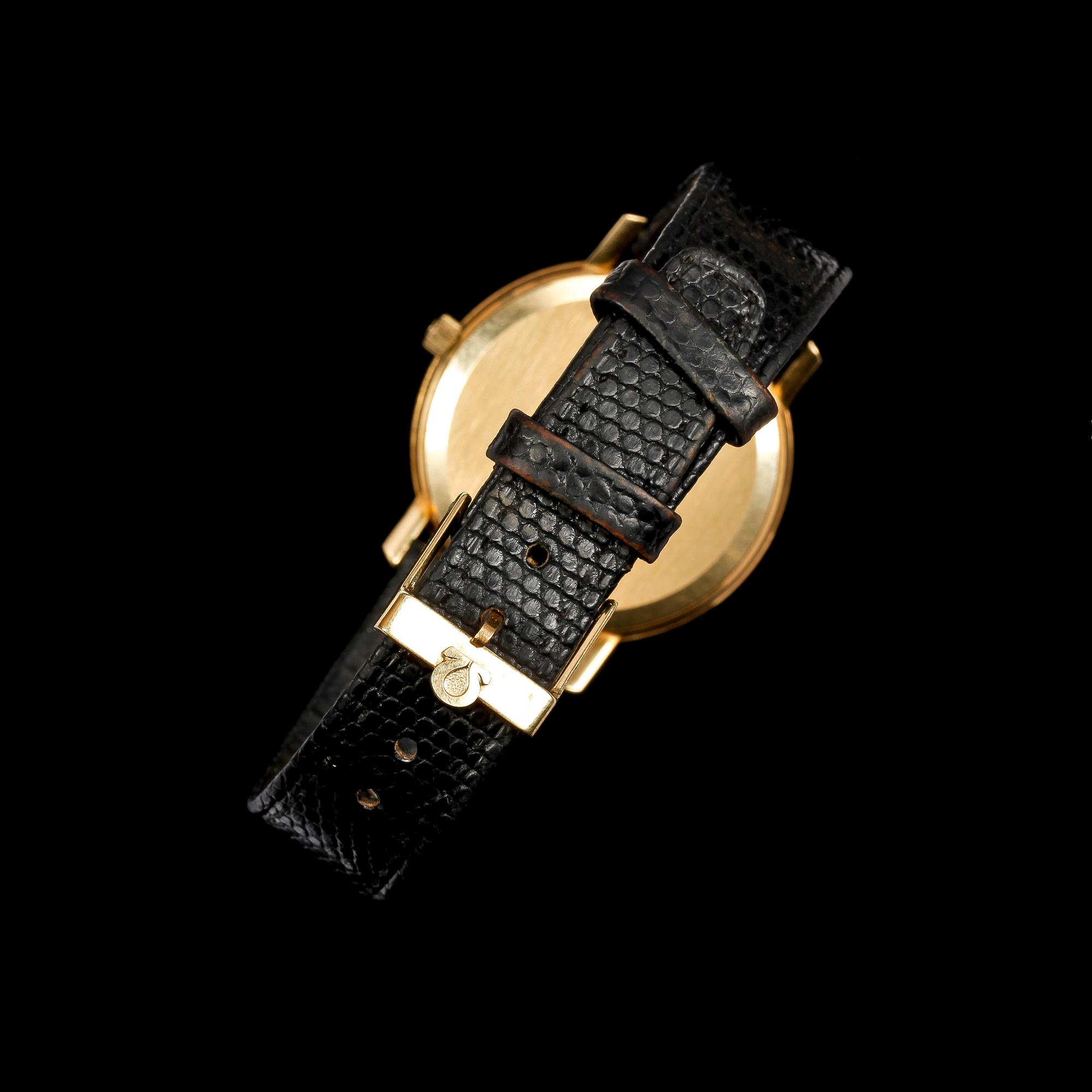 HERRARMBANDSUR, 2 st, 18k resp 14k guld, Omega resp Tissot.