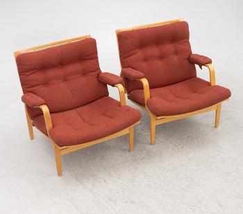 Bruno Mathsson, a pair of 'Ingrid' armchairs, Dux.