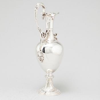 An English 19th century silver wine-jug, mark of Joseph Angle, London 1860.