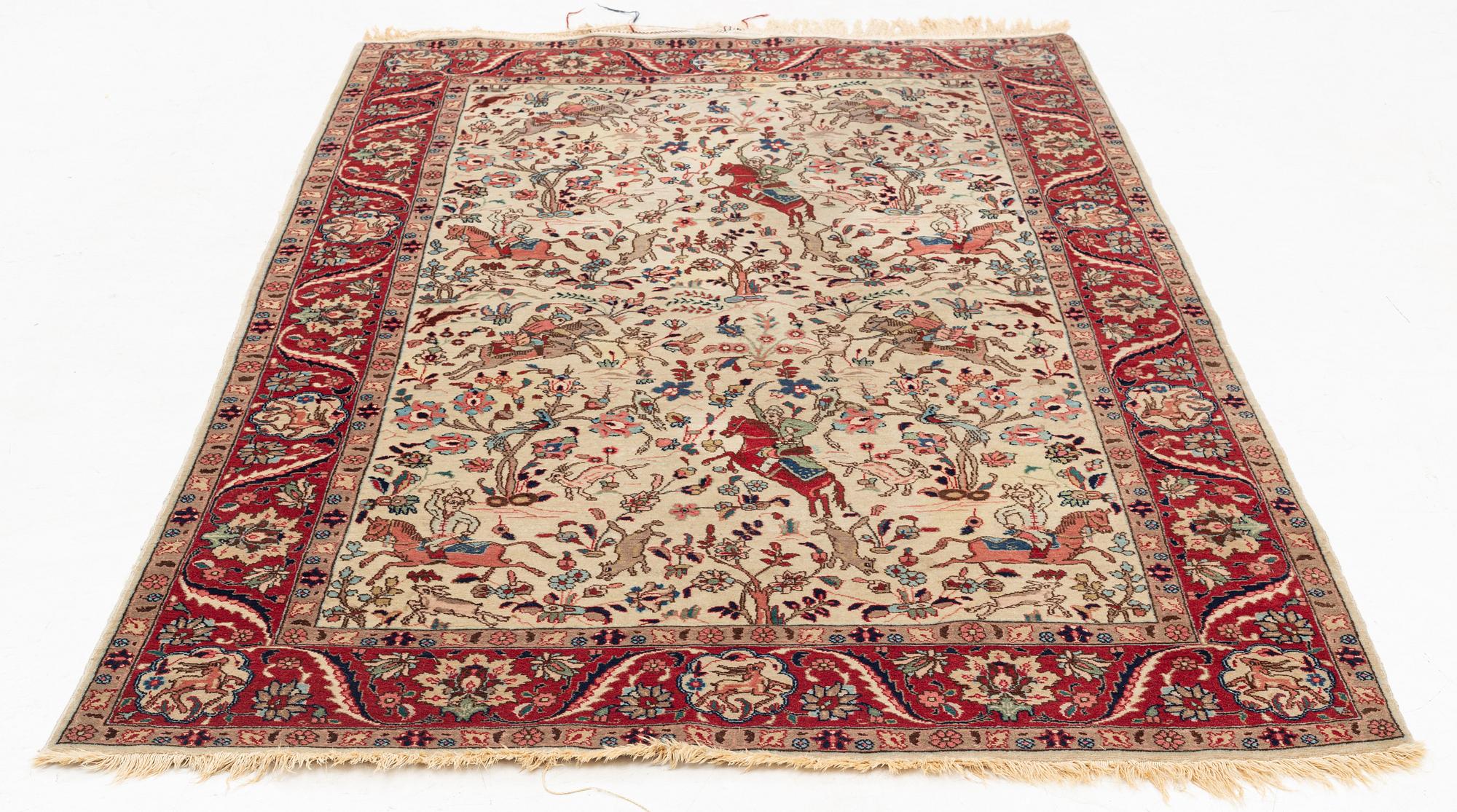 An oriental, figural rug, c. 230 x 145 cm.