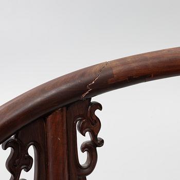 A Chinese hardwood folding chair, 20th century.