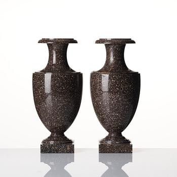 A pair of Swedish early 19th century 'Blyberg' porphyry urns.
