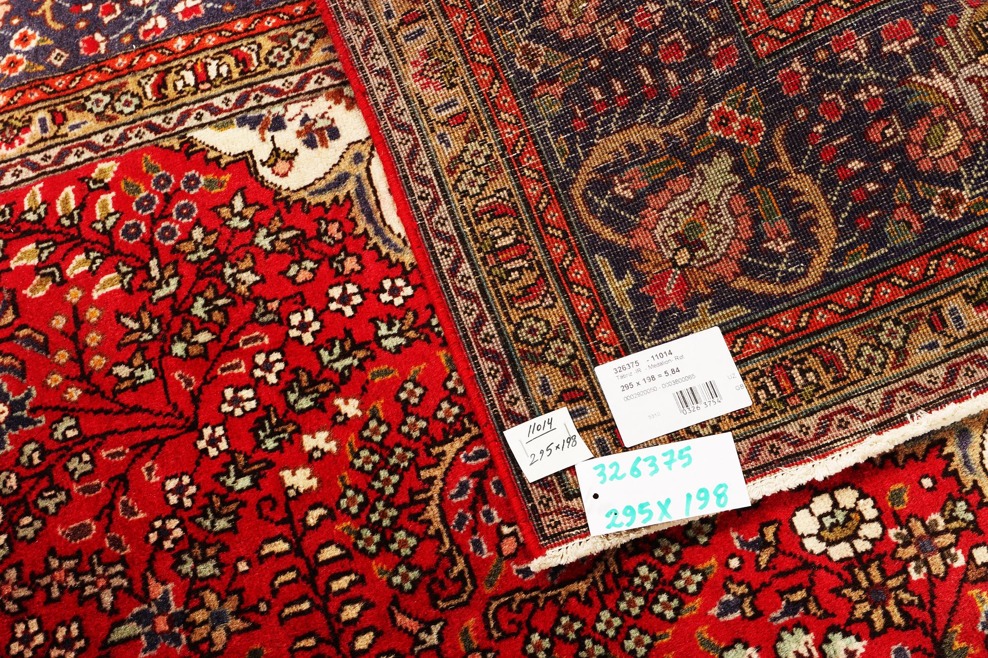 A Tabriz carpet, c 295 x 198 cm.