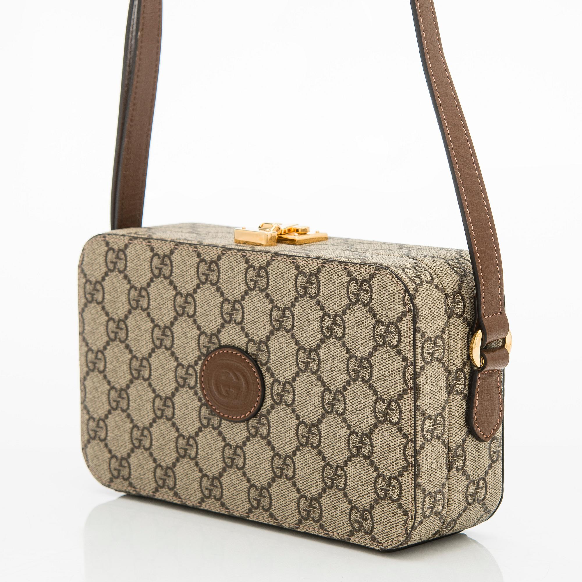 Gucci, "GG Supreme" laukku.