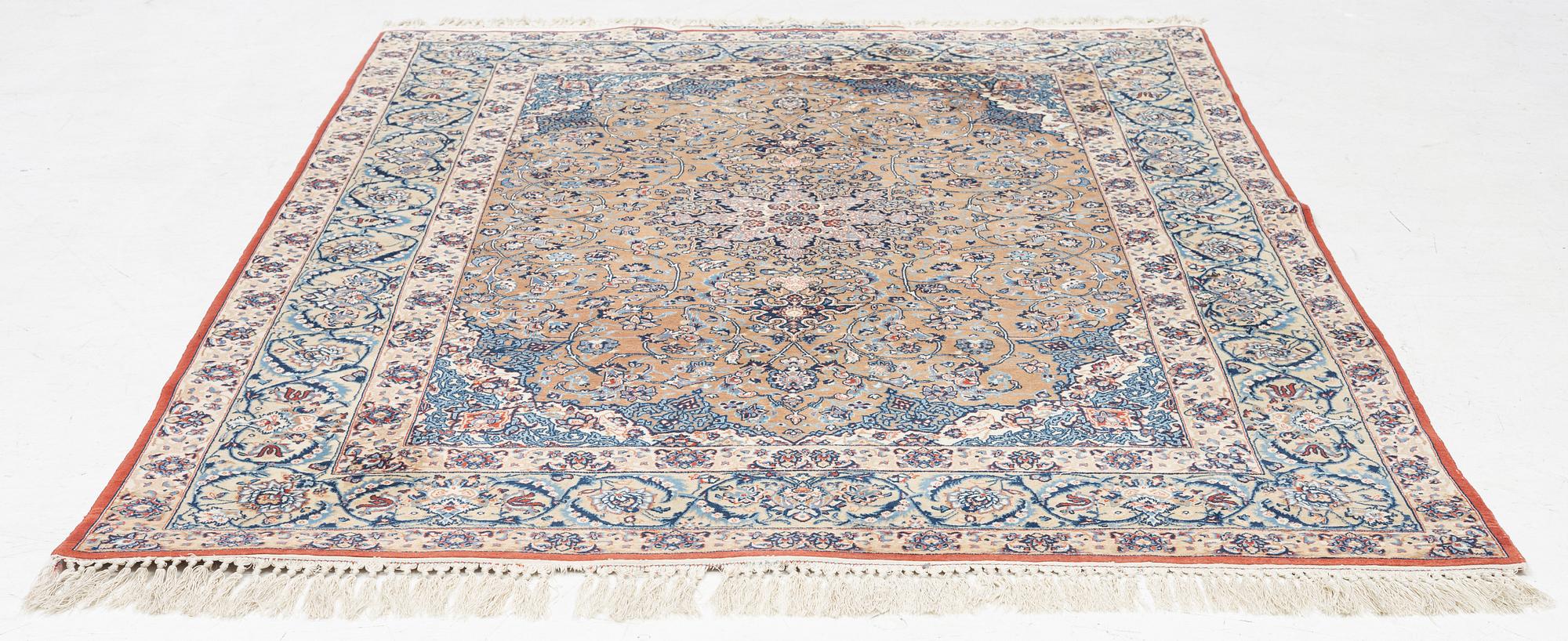 A Isfahan rug, signed (Hossein) Seirafian  222 x 150 cm.