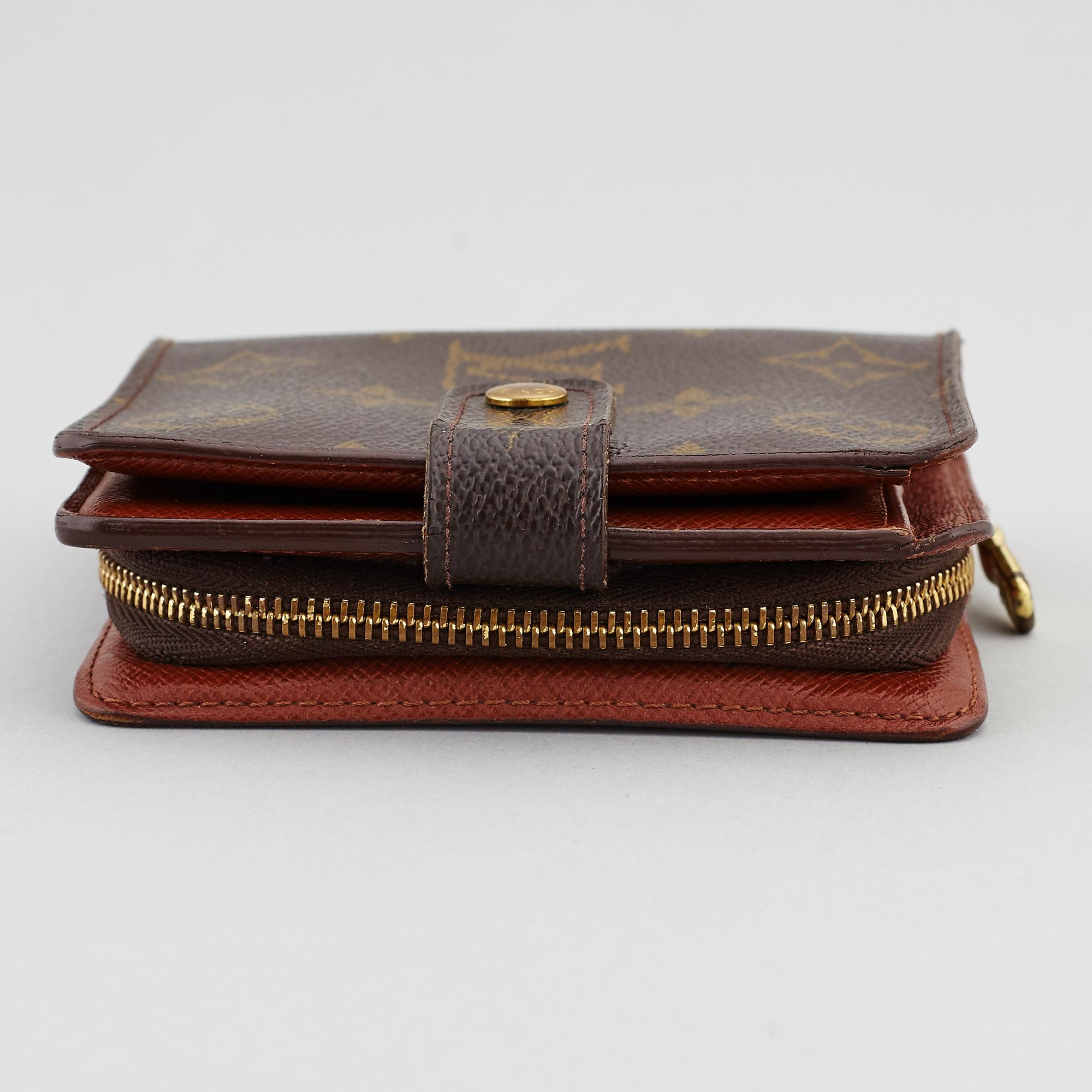 LOUIS VUITTON, a monogram canvas wallet.