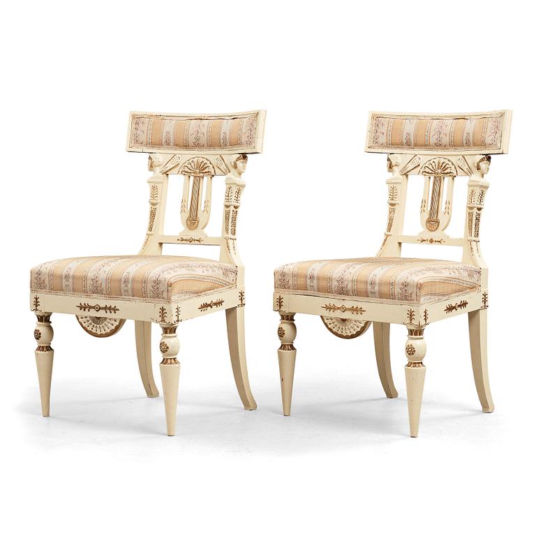 A pair of late Gustavian early 19th century chairs in the manner of Carl Christoffer Gjörwell (1766-1837).